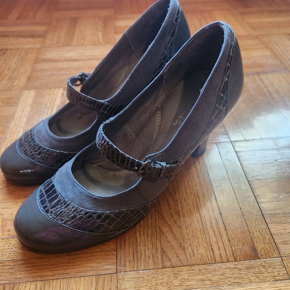 Aerosols grey patent leather and suede Mary janes with a chunky heel.